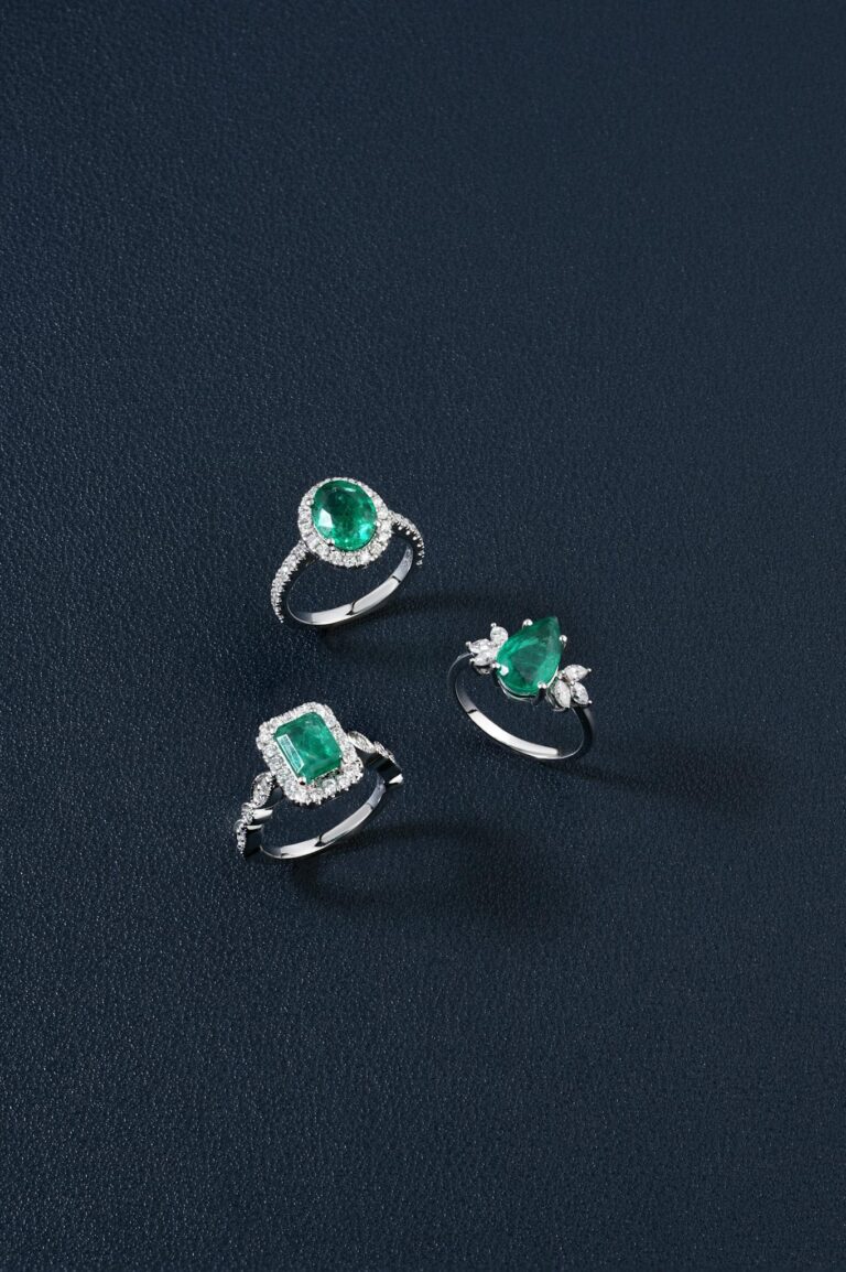 Close-up of Rings with Green Stones 