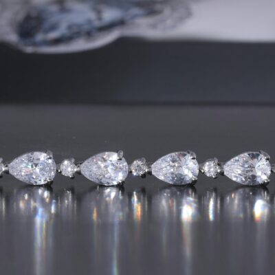 Diamonds on Silver Setting on a Flat Surface